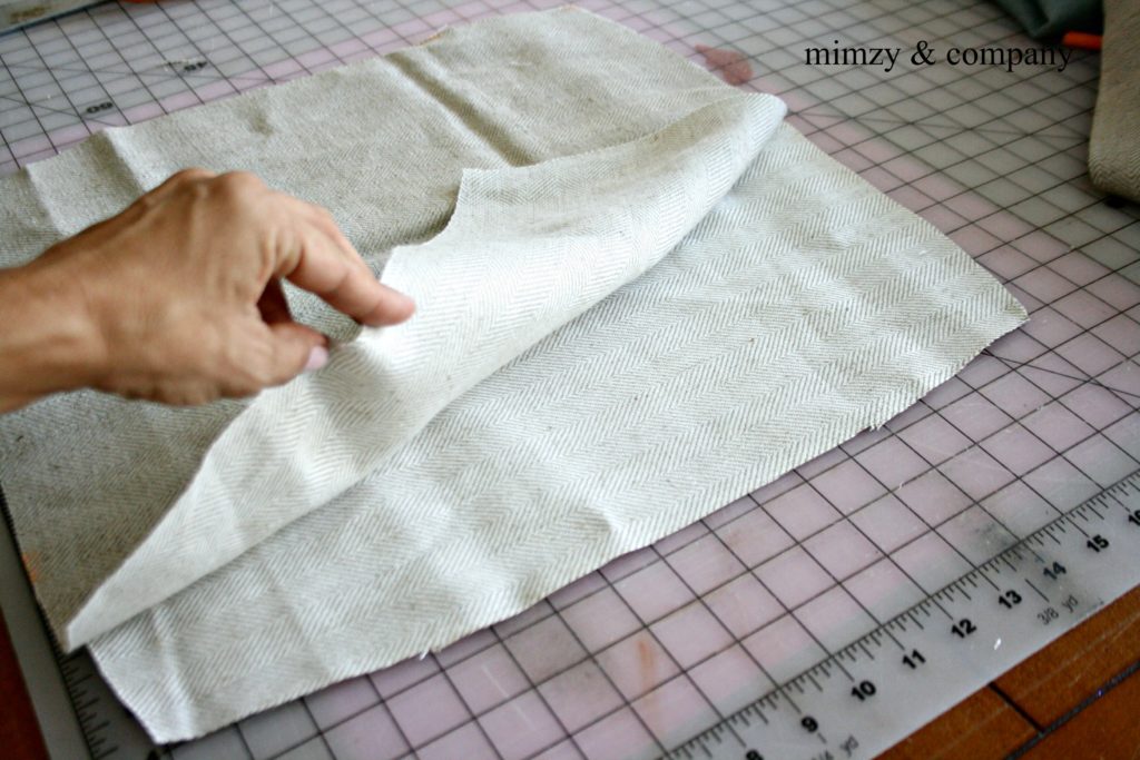 The EASIEST throw pillow to makelumbar pillow made from an Ikea area rug.  • mimzy & company