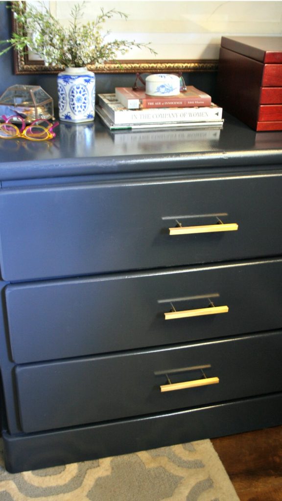 dark painted nightstand. dresser with gold pulls