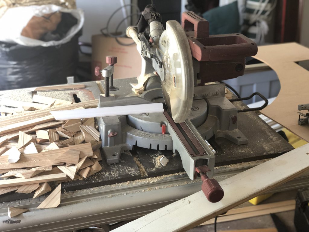 chop saw with moulding pieces